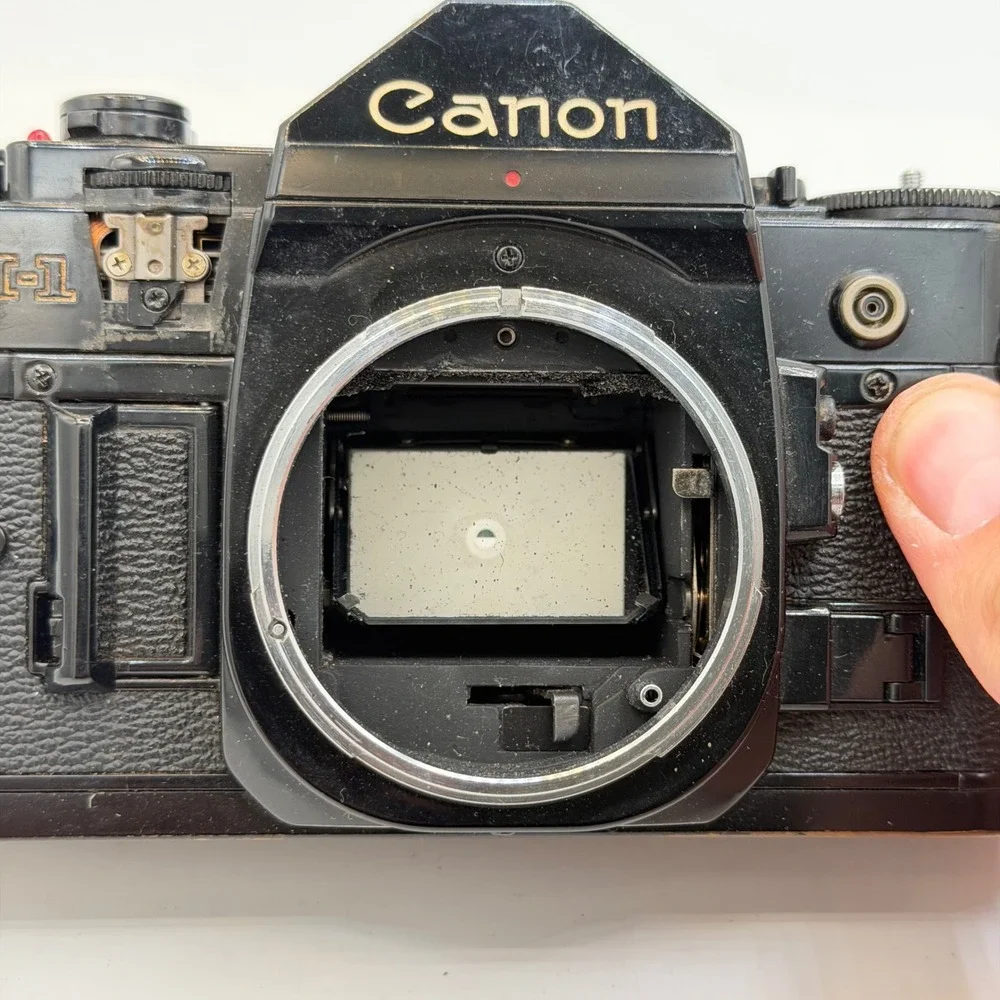 Lot of 2 Canon A-1 35mm SLR Film Camera Body Black Vintage Tested - For Parts